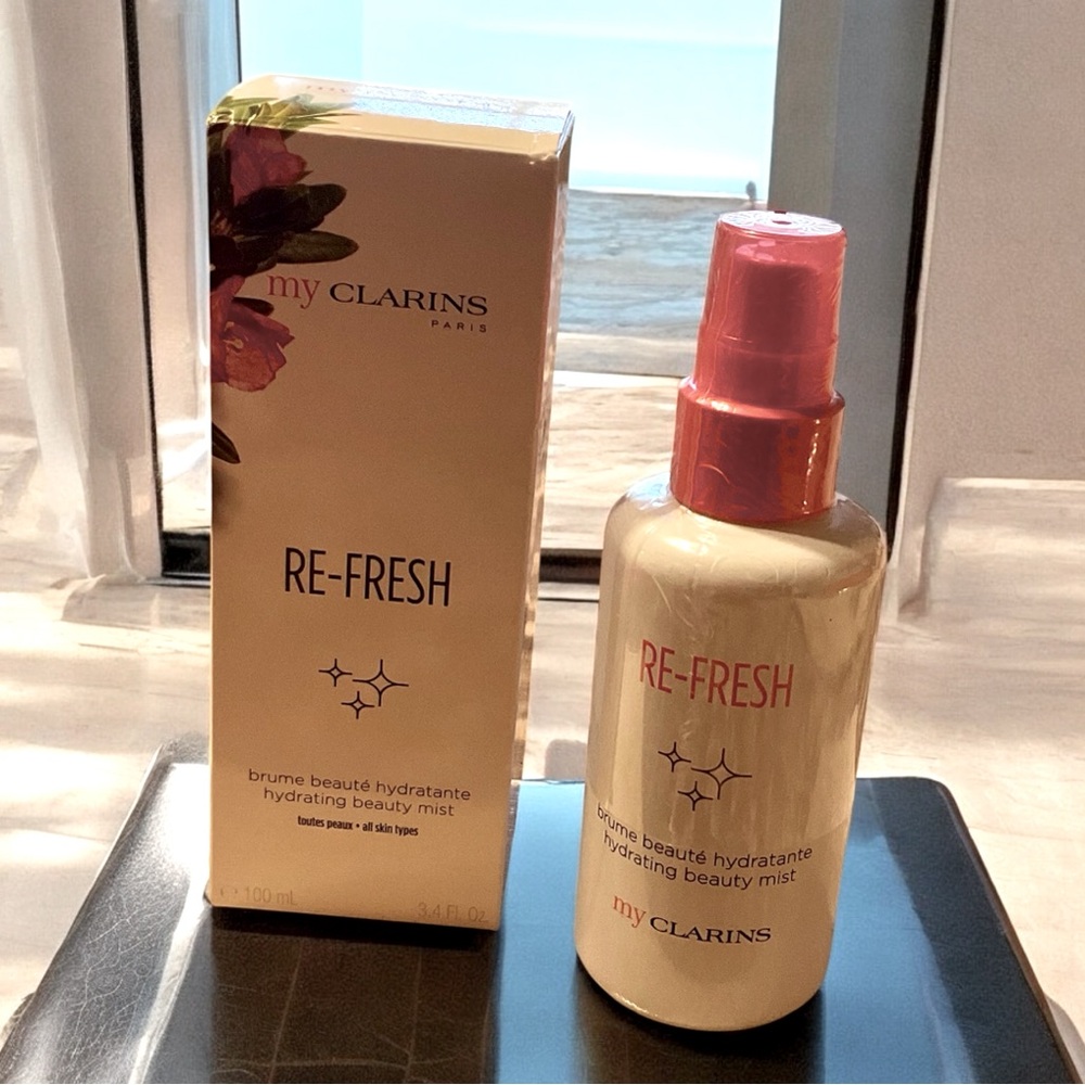 THE CLARINS PARIS RE-FRESH HYDRATING BEAUTY MIST 3.4 fl oz.